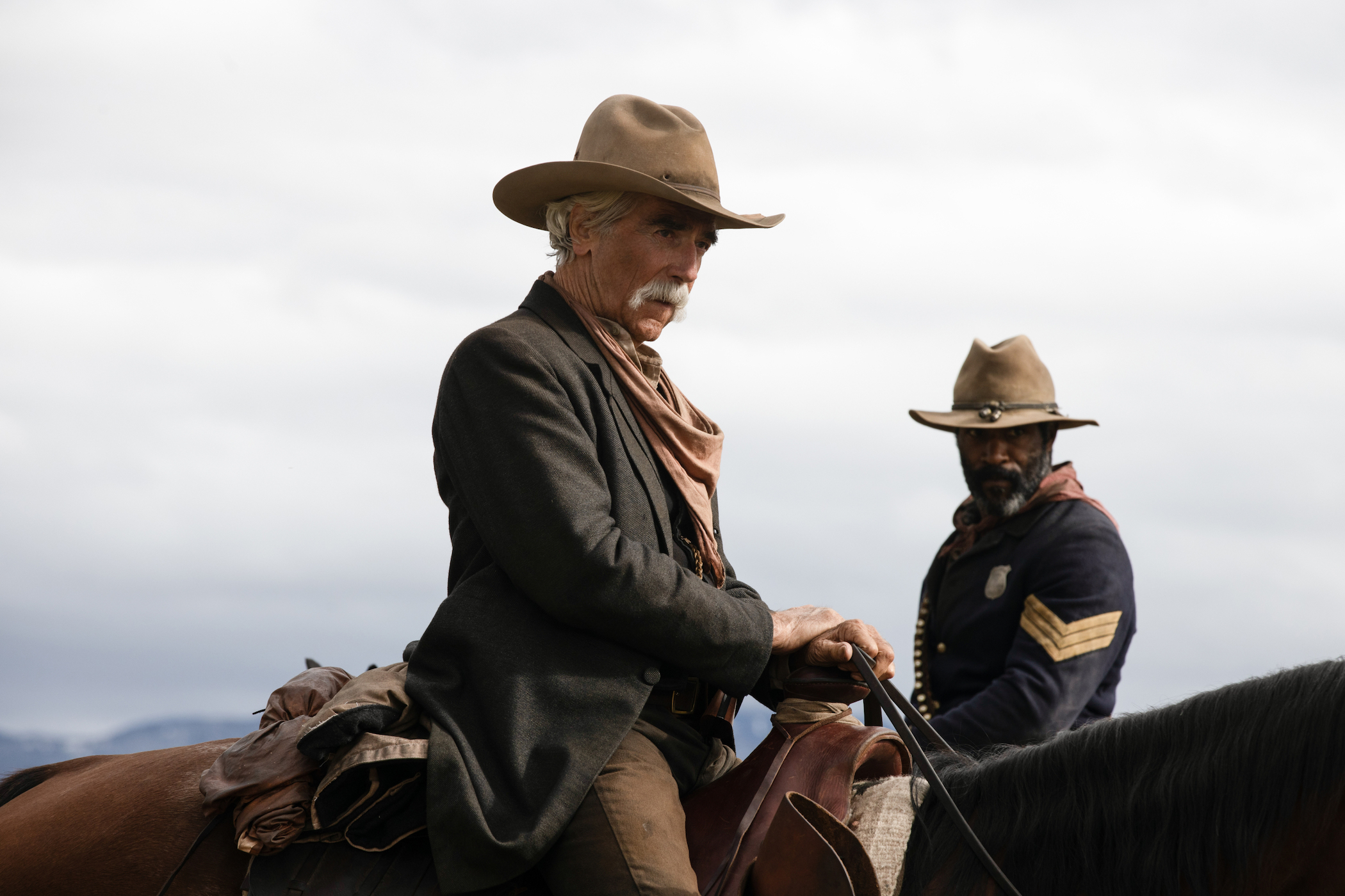 Sam Elliott as Shea and LaMonica Garrett as Thomas on horses in '1883'