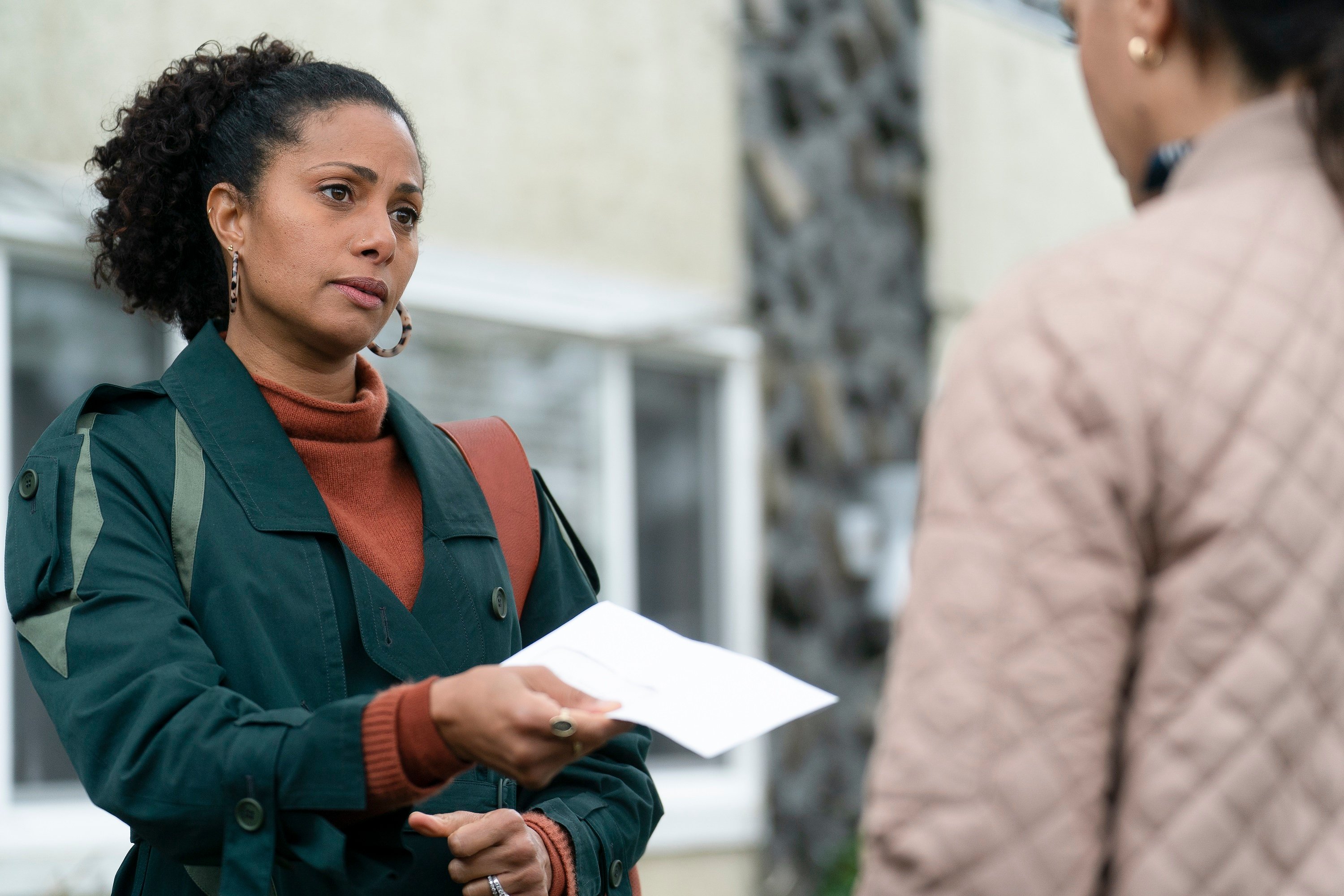 'A Million Little Things' Season 4 Episode 9 Christina Moses holds an envelope in her hand as Regina Howard