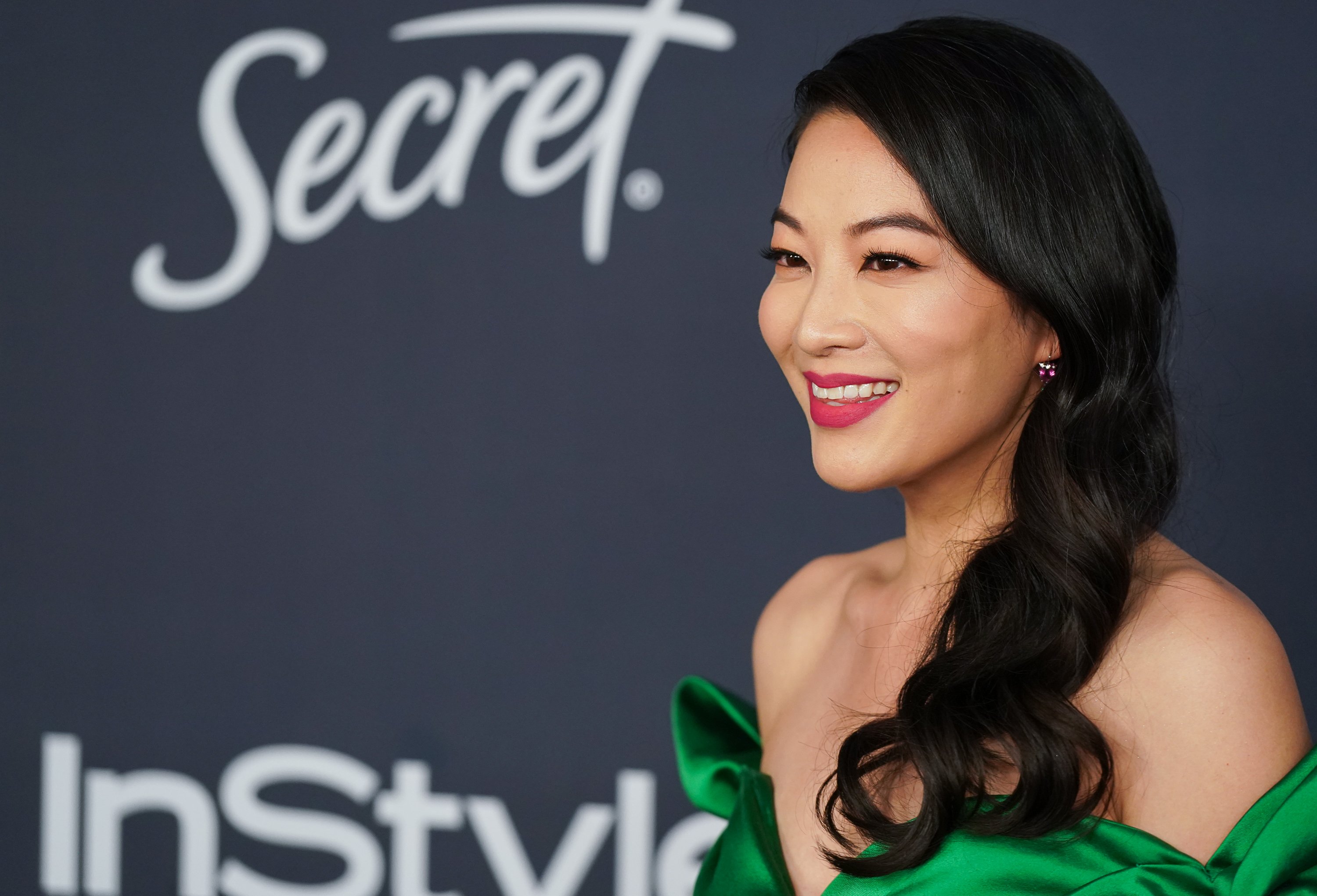 'Teen Wolf' star Arden Cho wears a green dress.