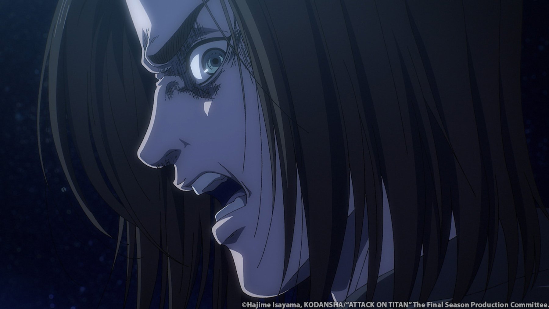 Eren Jaeger in 'Attack on Titan' Season 4 Part 2. The image shows a side profile of his face and he's angry and shouting.