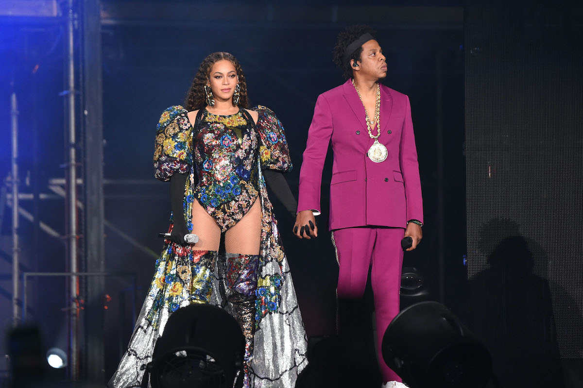 Beyoncé and Jay-Z holding hands on stage