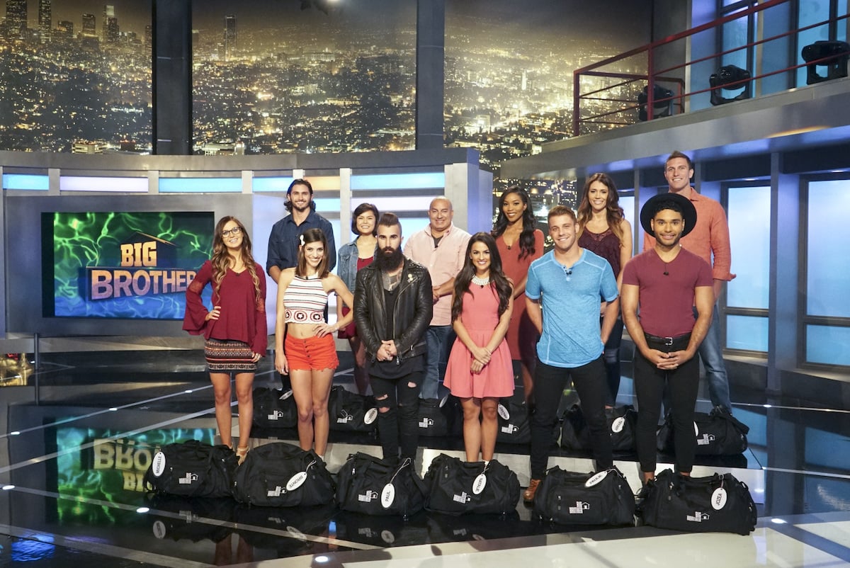 Big Brother cast members on a stage