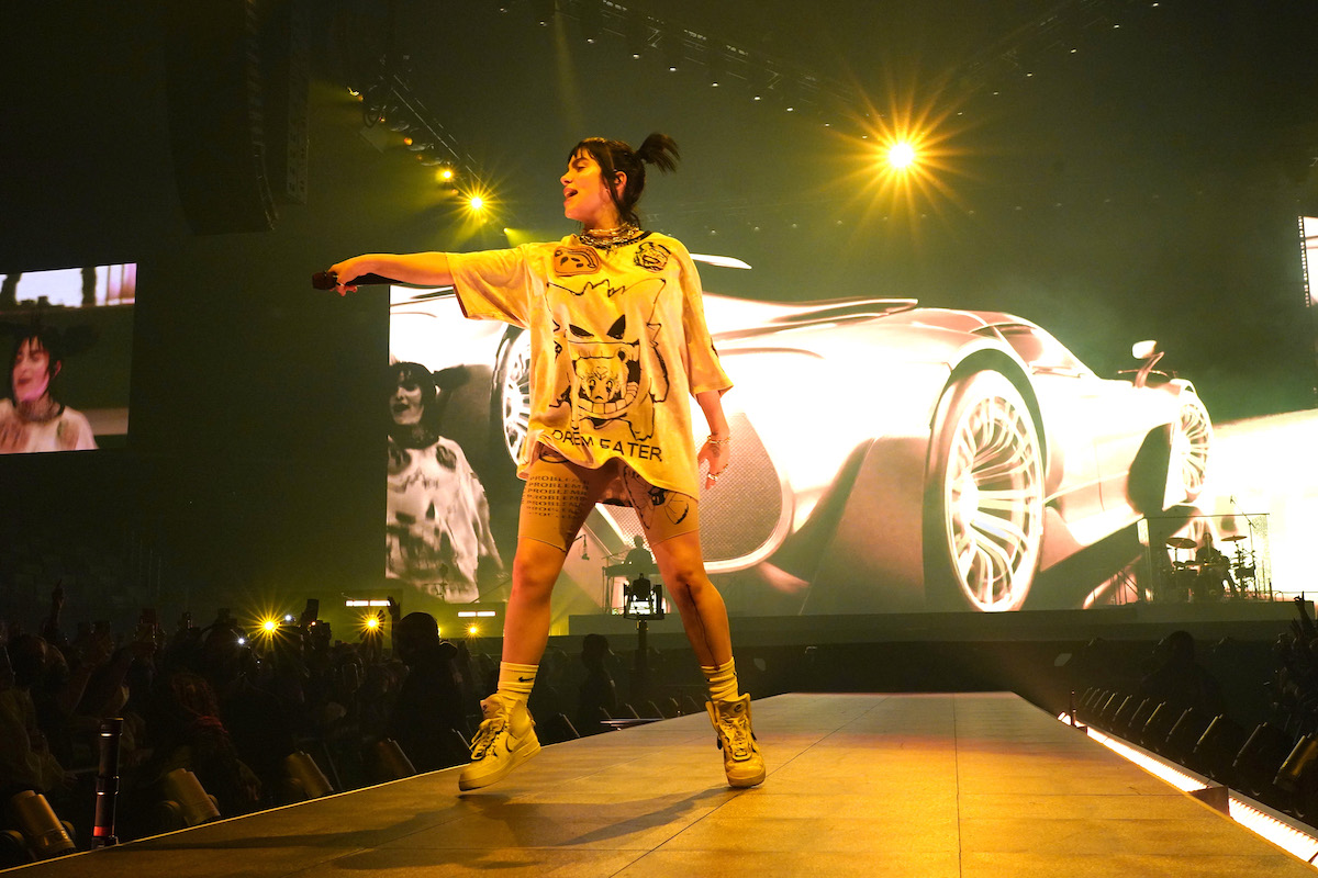 Billie Eilish performs on stage.