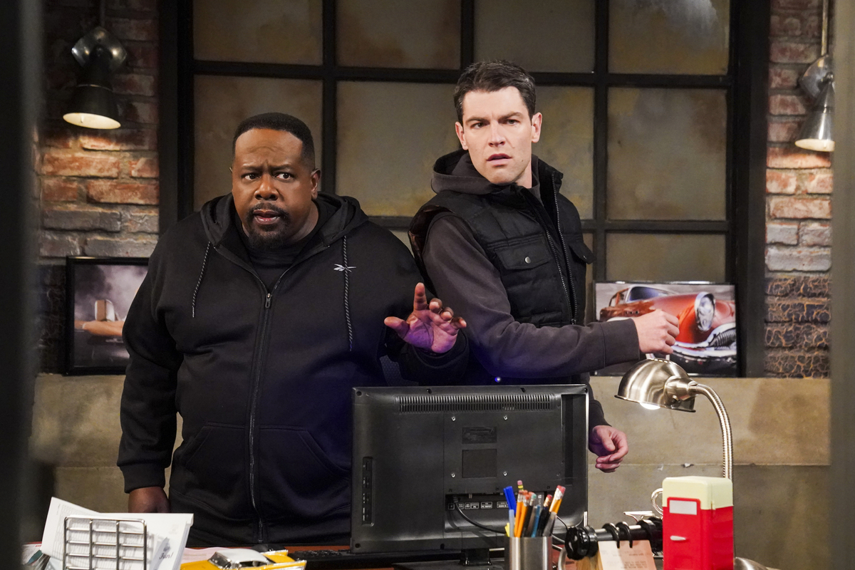 Cedric the Entertainer as Calvin Butler and Max Greenfield as Dave Johnson in 'The Neighborhood,' a show that'll crossover with 'Bob Hearts Abishola'