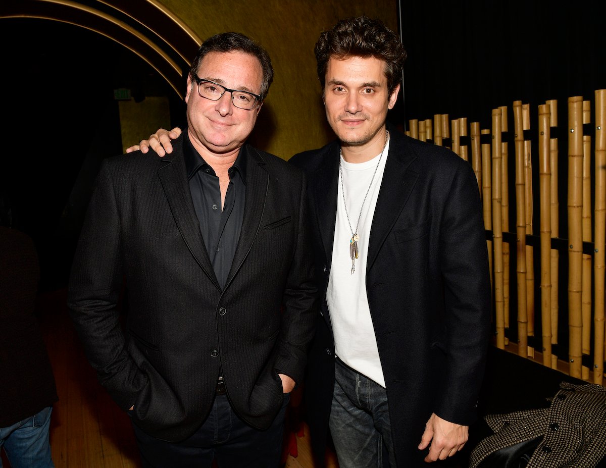 Bob Saget and John Mayer pose together at an event.