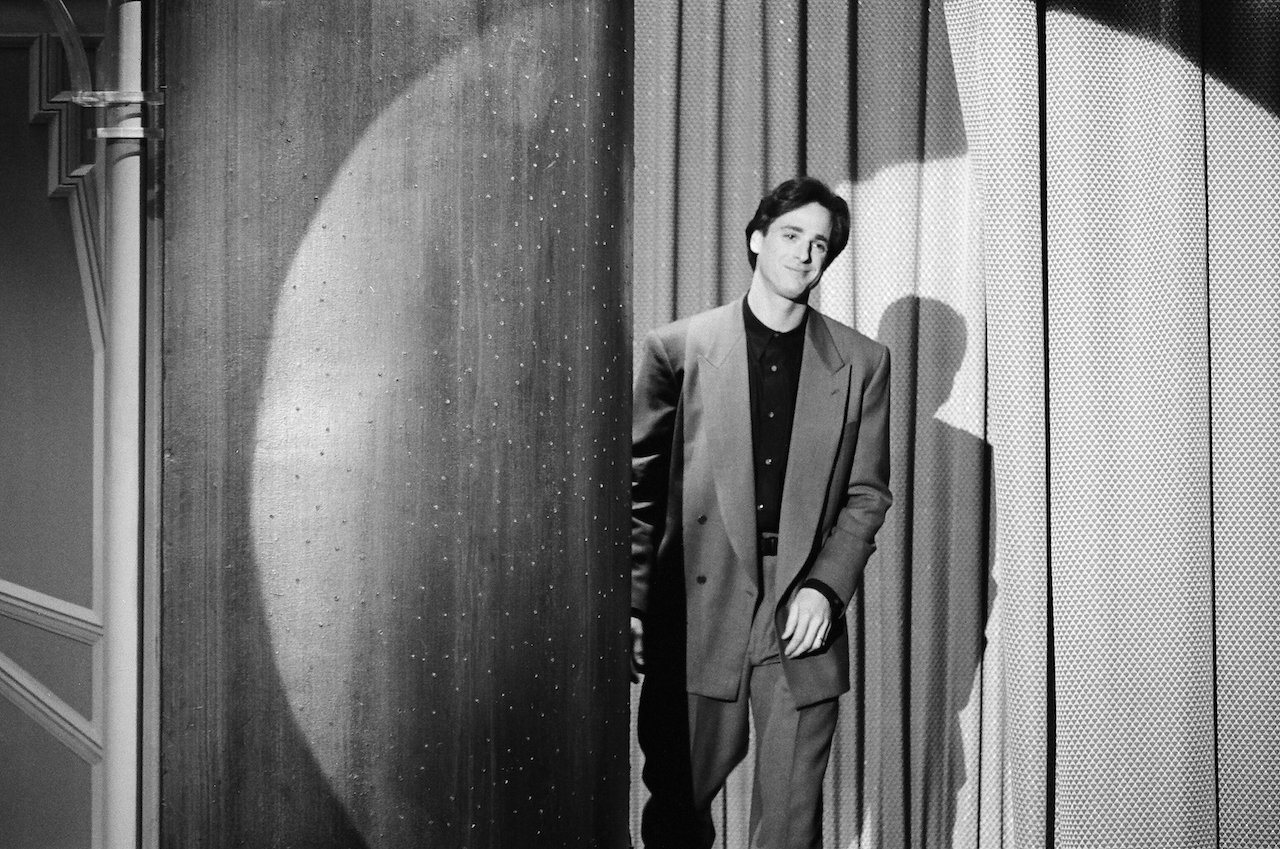 Bob Saget arrives to 'The Tonight Show' on April 11, 1991 (black and white)