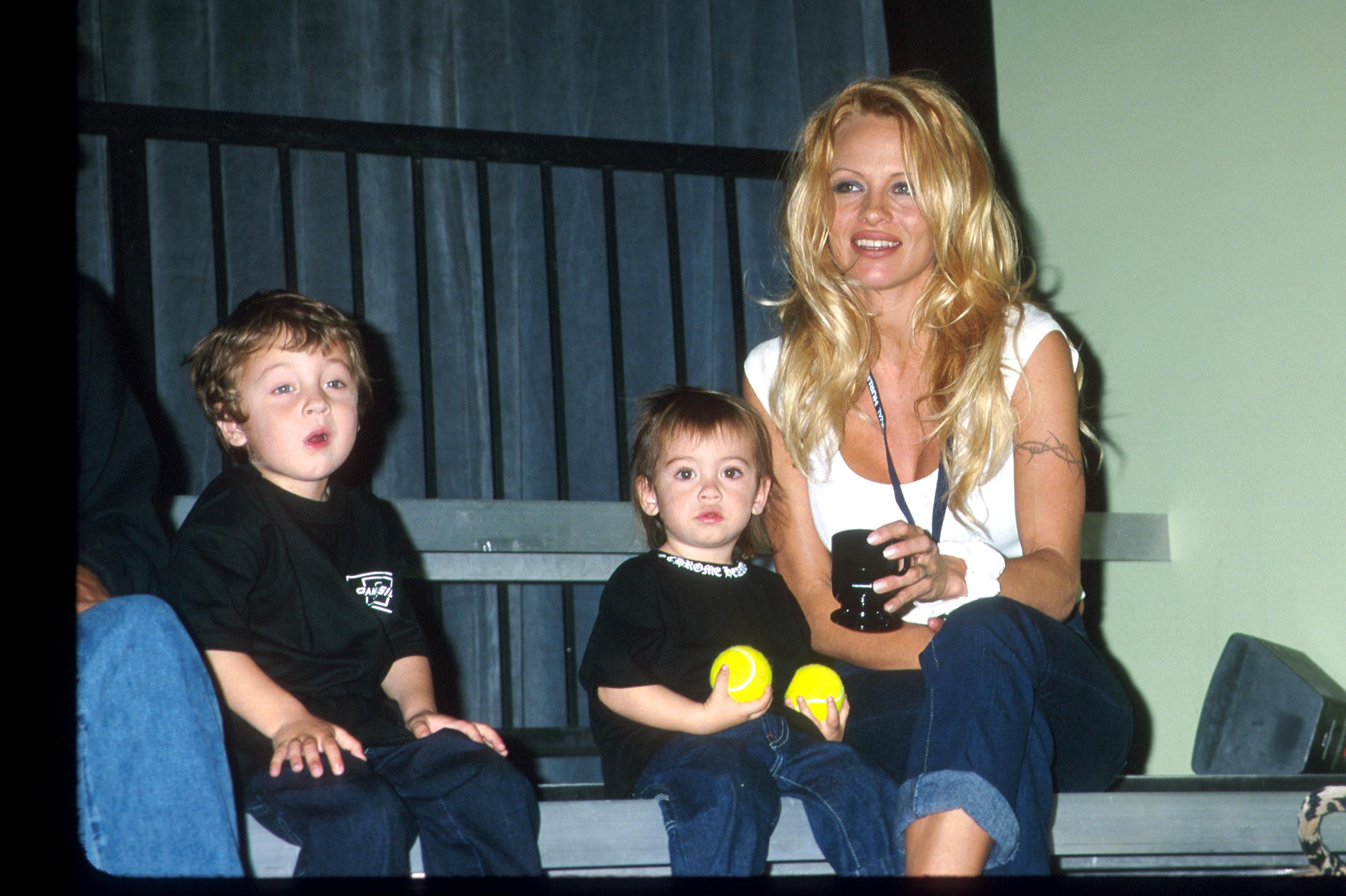 Brandon Lee, Pamela Anderson, and Dylan Lee in 2000