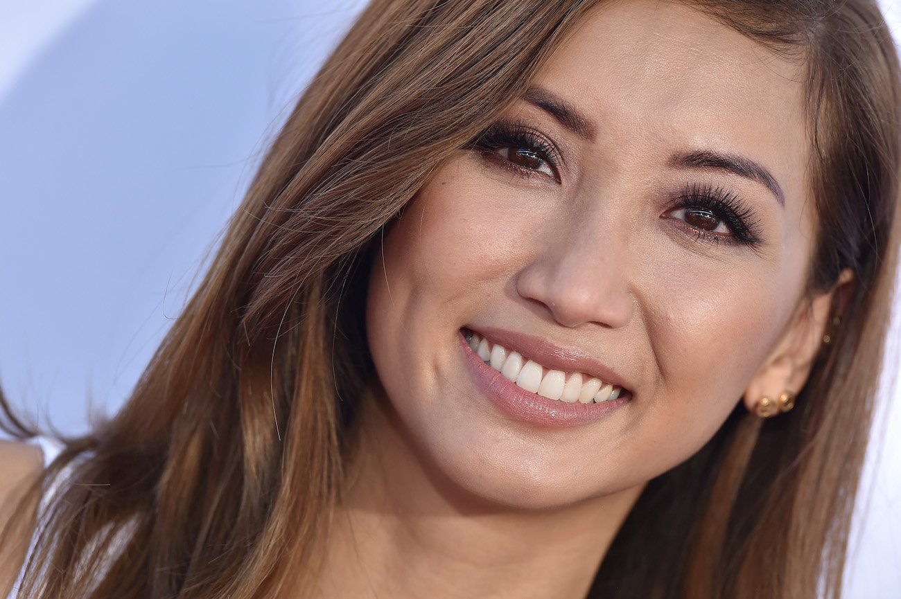 Brenda Song smiling, close up