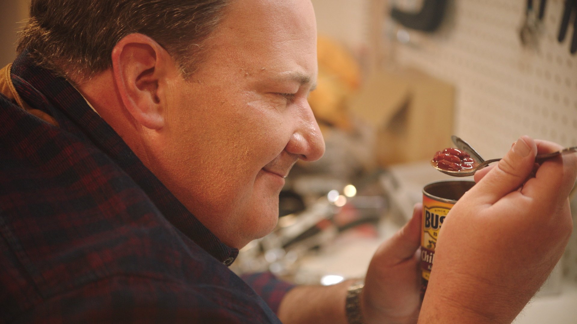 'The Office' actor Brian Baumgartner holding a can of Bush's chili beans