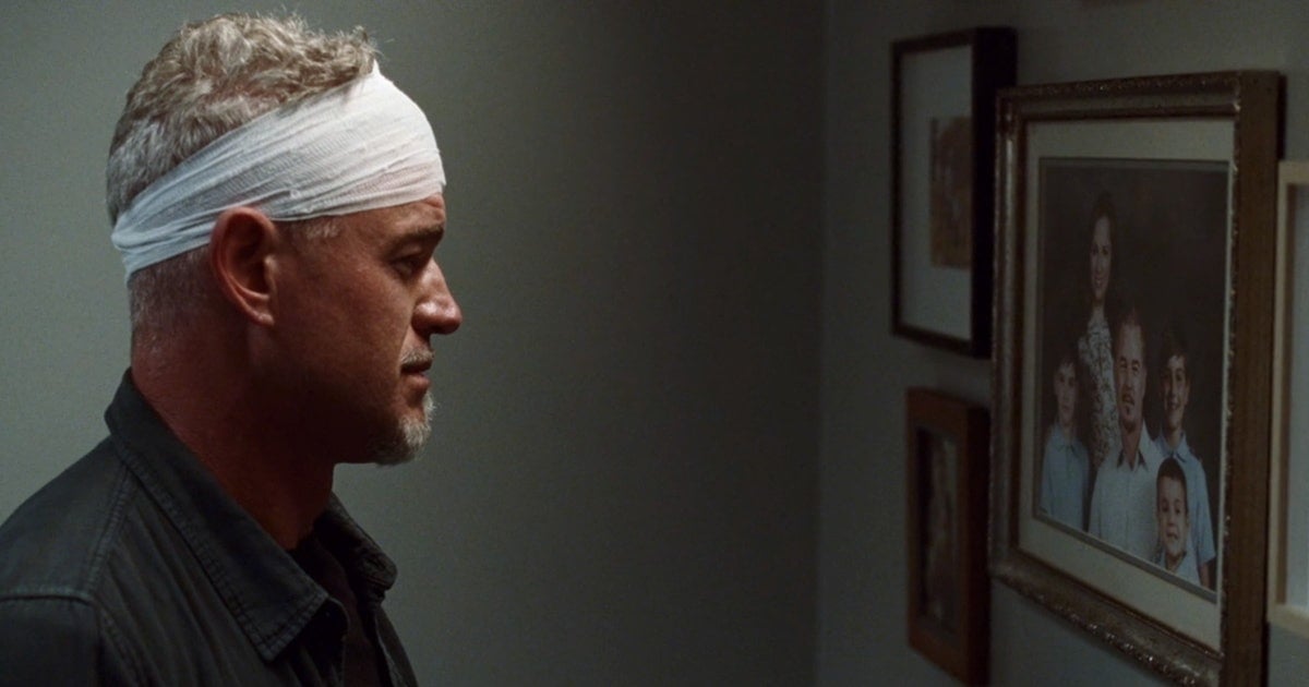 Cal Jacobs (Eric Dane) looking at the Jacobs family photo in 'Euphoria' 