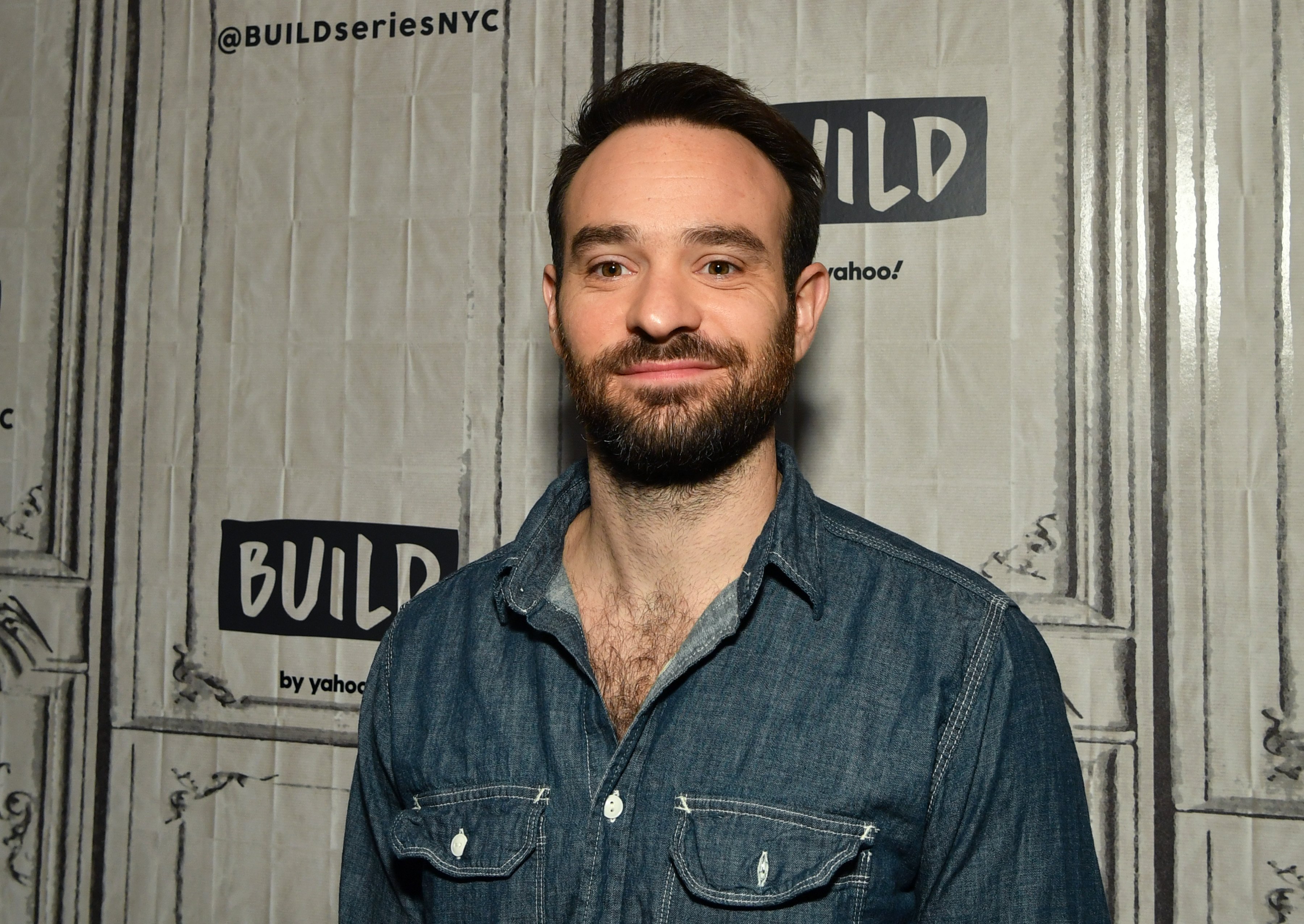 Charlie Cox, who played Matt Murdock in 'Daredevil,' wears a denim button-up shirt.