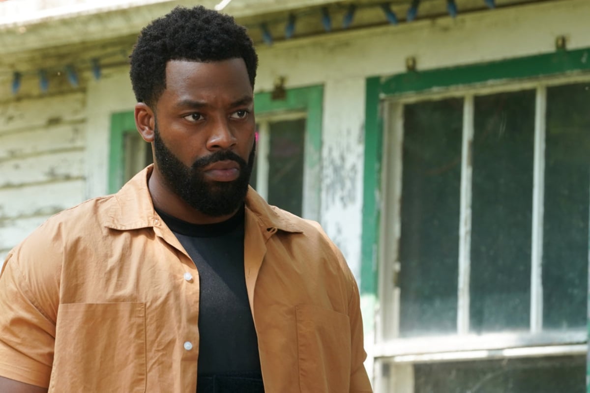 LaRoyce Hawkins as Kevin Atwater in Chicago P.D. Season 9. Atwater wears a yellows button down over a grey shirt.
