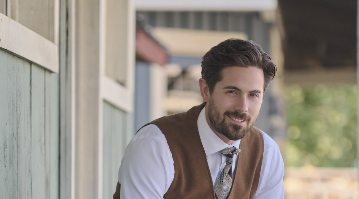 Chris McNally as Lucas Bouchard, wearing a vest, in an episode of 'When Calls the Heart' Season 9.