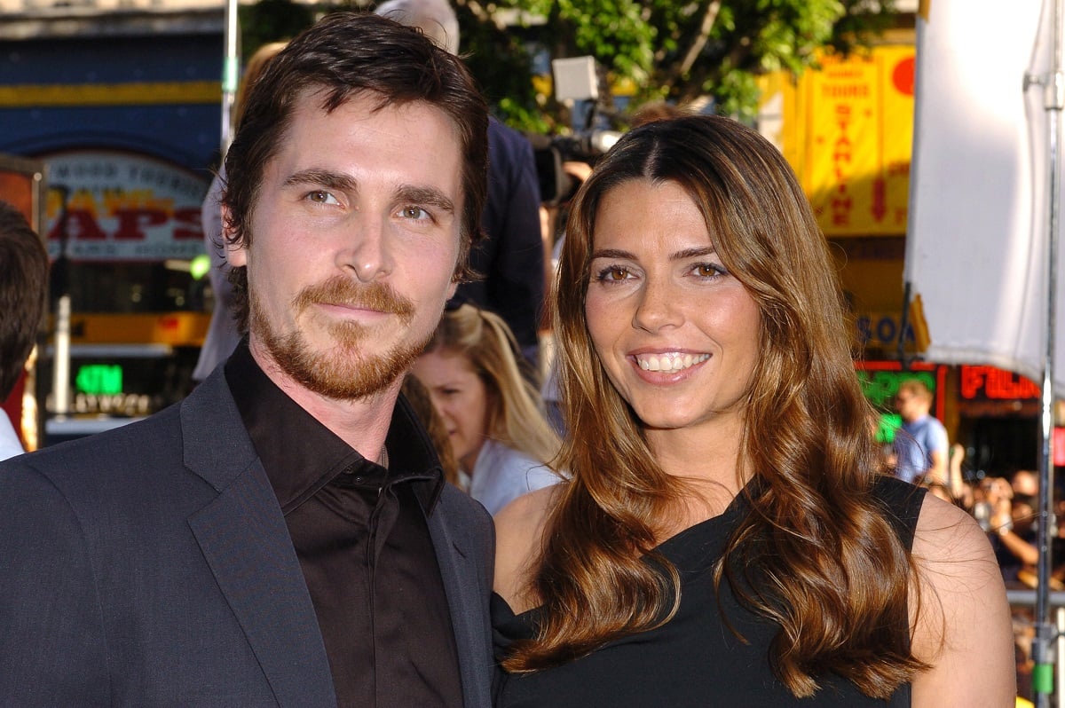 Christian Bale smiling with his wife Sibi Blazic.