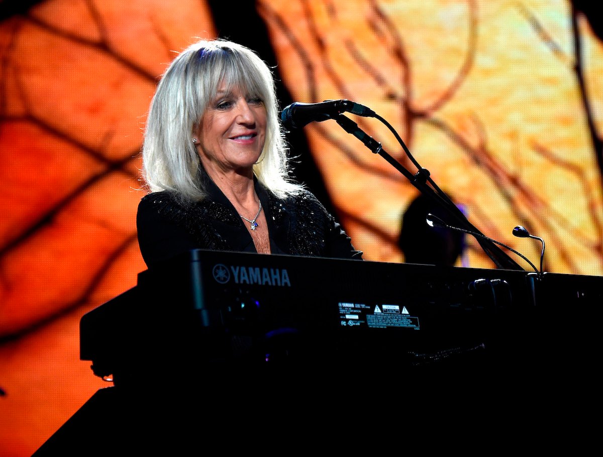 Christine McVie plays the keyboard with Fleetwood Mac.