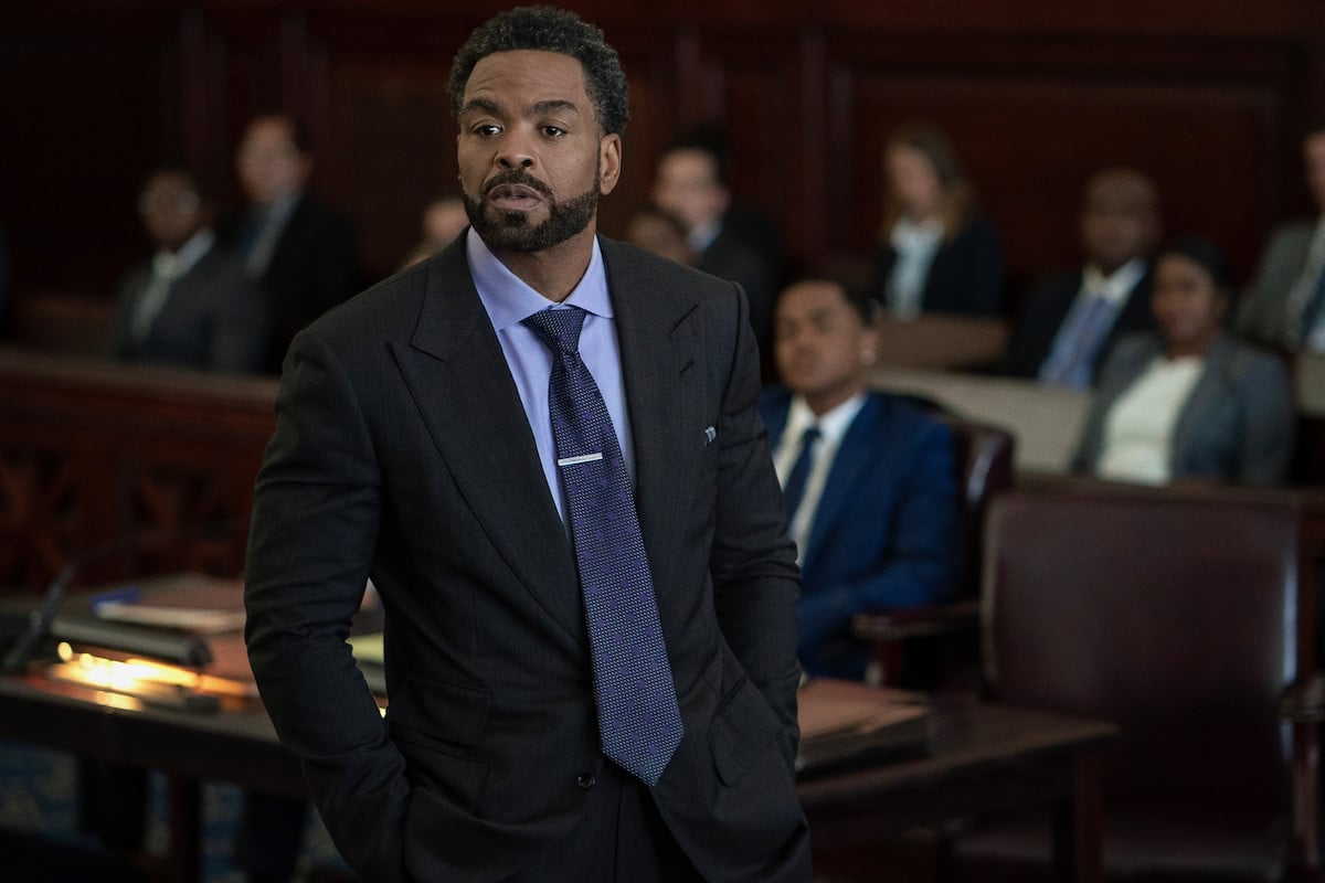 Clifford "Method Man" Smith as Davis Maclean  wearing a blue suit and standing in a courtroom in 'Power Book II: Ghost' 