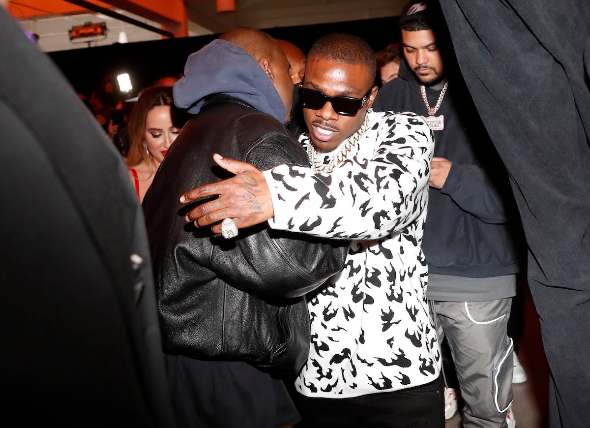 Ye and DaBaby hug at the jeen-yuhs experience and special screening celebrating Netflix's new documentary, "jeen-yuhs: A Kanye Trilogy"