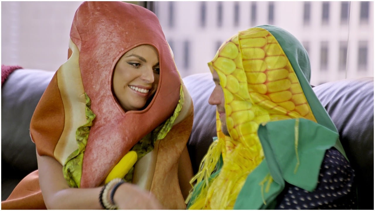 Danielle Ruhl and Nick Thompson dressed up in hot dog and corn costumes