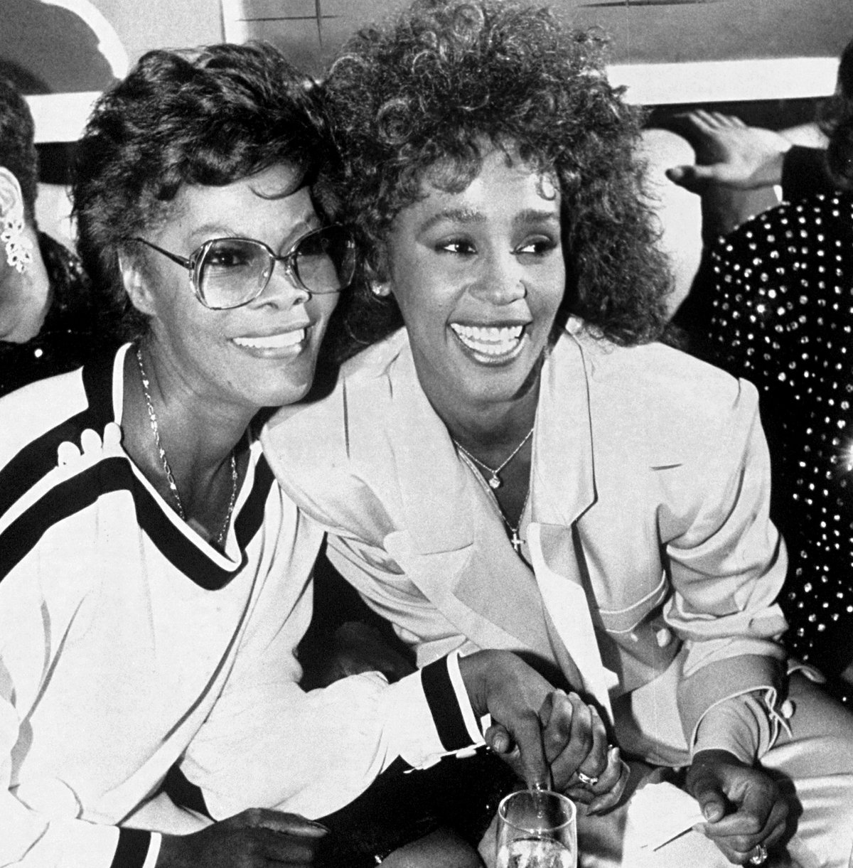 Dionne Warwick and Whitney Houston smile for camera