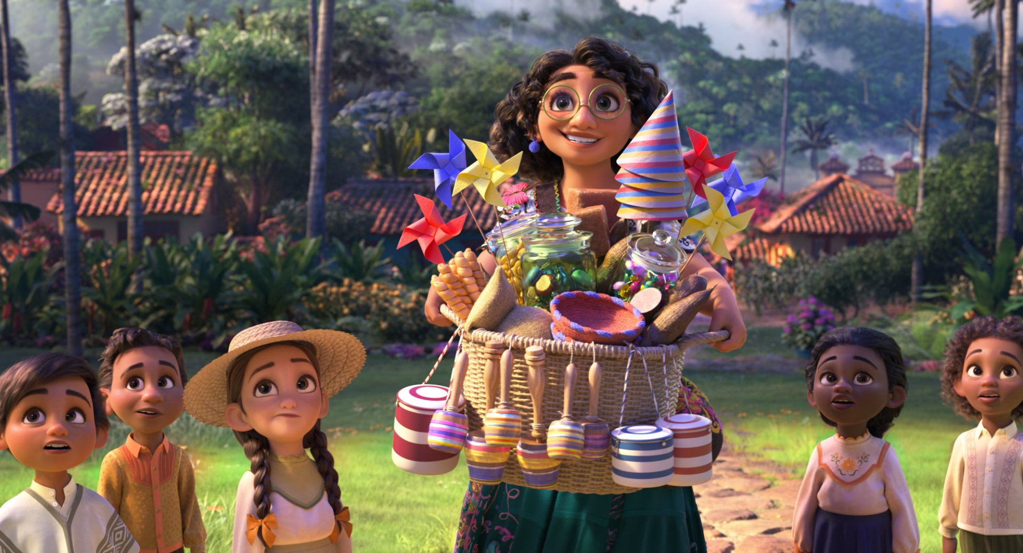 Disney's 'Encanto' Mirabel voiced by Stephanie Beatriz holding a box of fireworks next to children