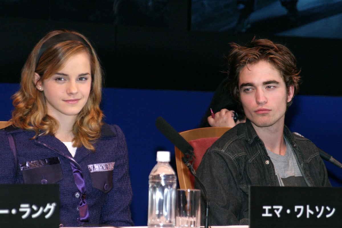 Emma Watson and Robert Pattinson attend a Harry Potter press conference