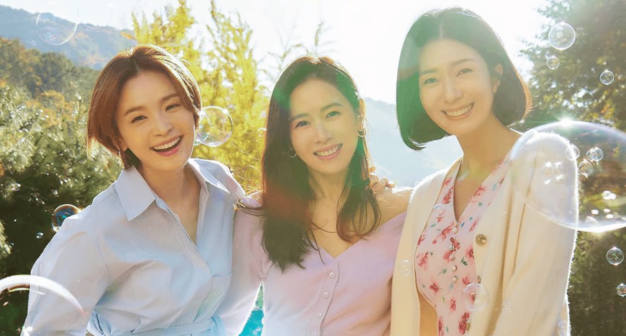 Female lead characters in 'Thirty-Nine' K-drama wearing floral dresses.