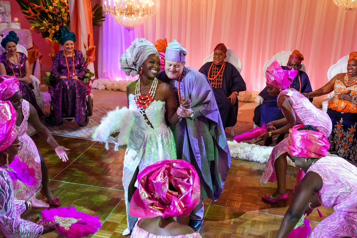 Folake Olowofoyeku wearing the 'Bob Hearts Abishola' wedding dress with Billy Gardell as Abishola and Bob