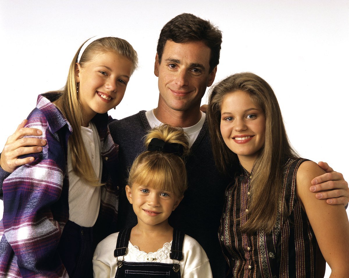 Jodie Sweetin, Bob Saget, Ashley Olsen, and Candace Cameron pose together for "Full House."