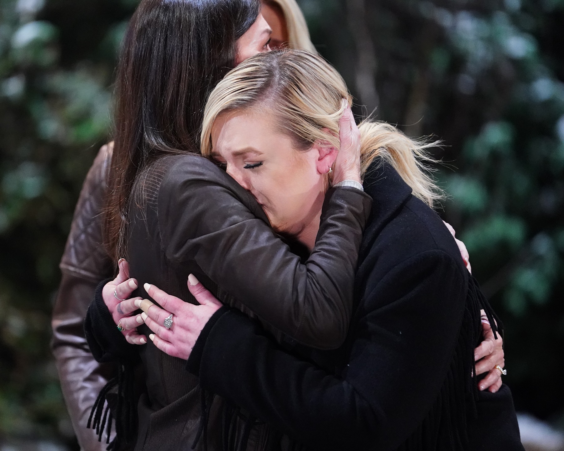 In a scene from 'General Hospital,' Maxie cries into Anna's shoulder, while wearing all-black.