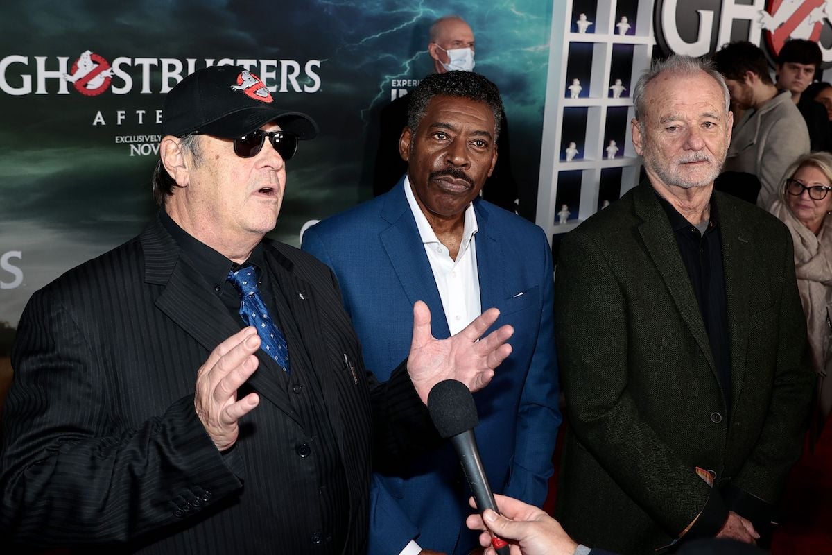 Dan Aykroyd speaks as Ernie Hudson and Bill Murray look on