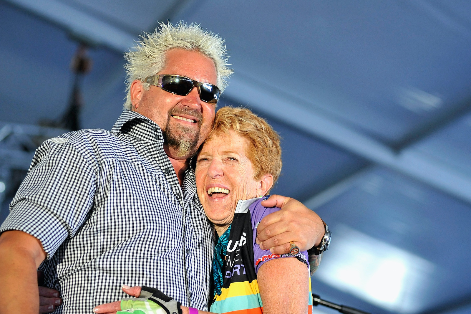 Guy Fieri and mom Penelope Ferry speak on stage at the Finish Line and Victory Celebration Party during the Best Buddies Challenge: Hyannis Port 2015