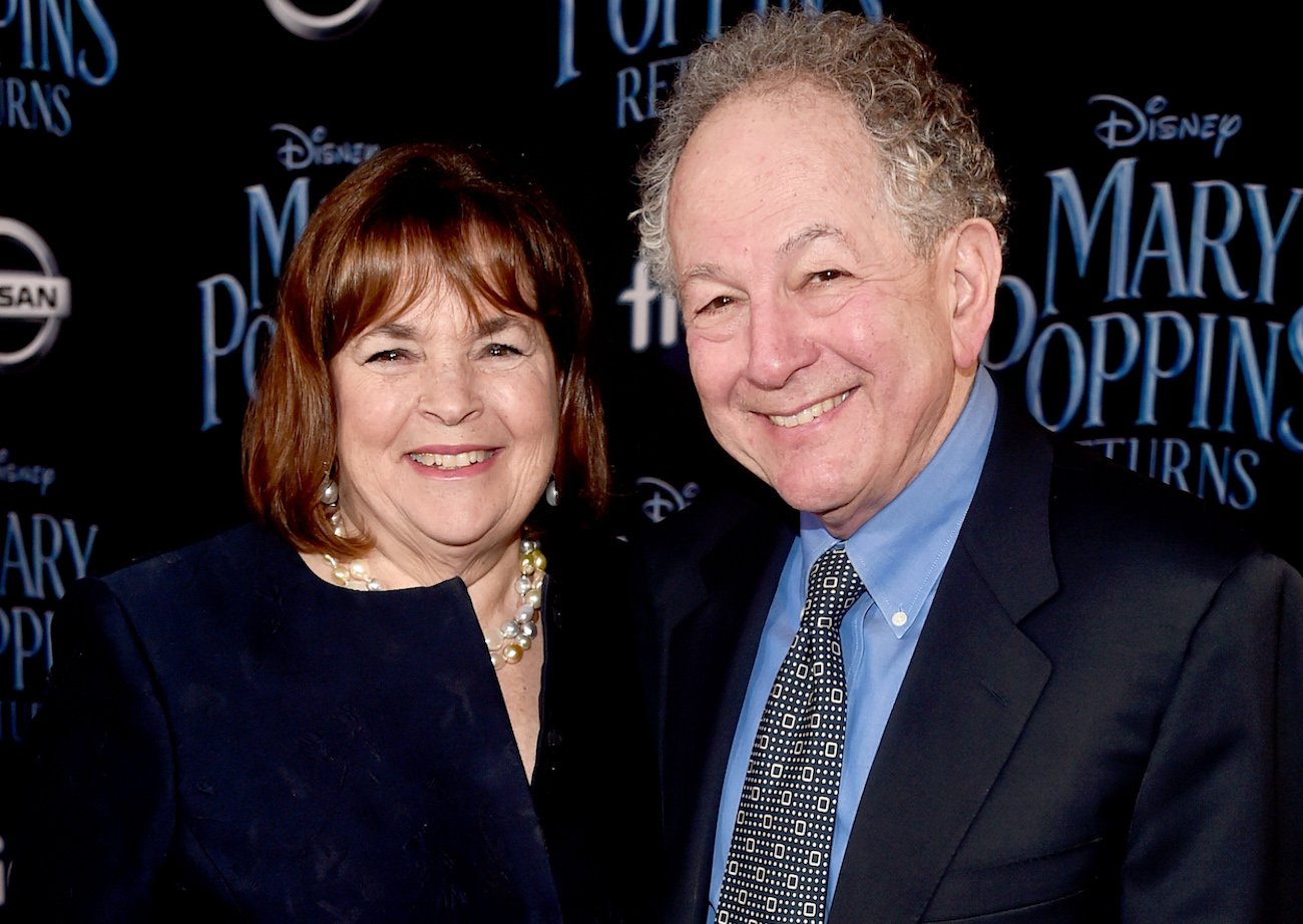 Barefoot Contessa Ina Garten and Jeffrey Garten smile as they pose next to each other for photographers