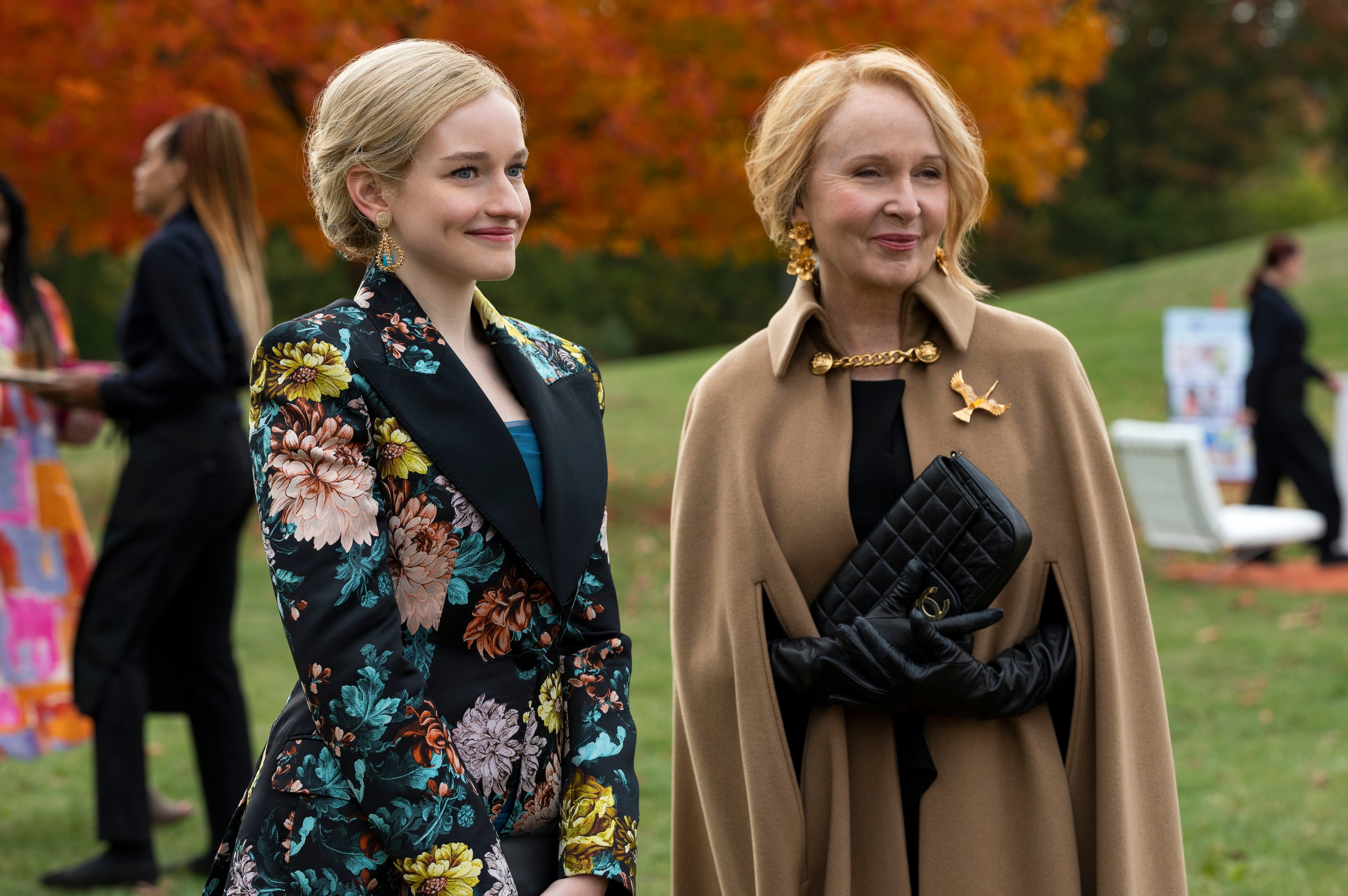 Julia Garner and Kate Burton smiling together in one of the 'Inventing Anna' episodes