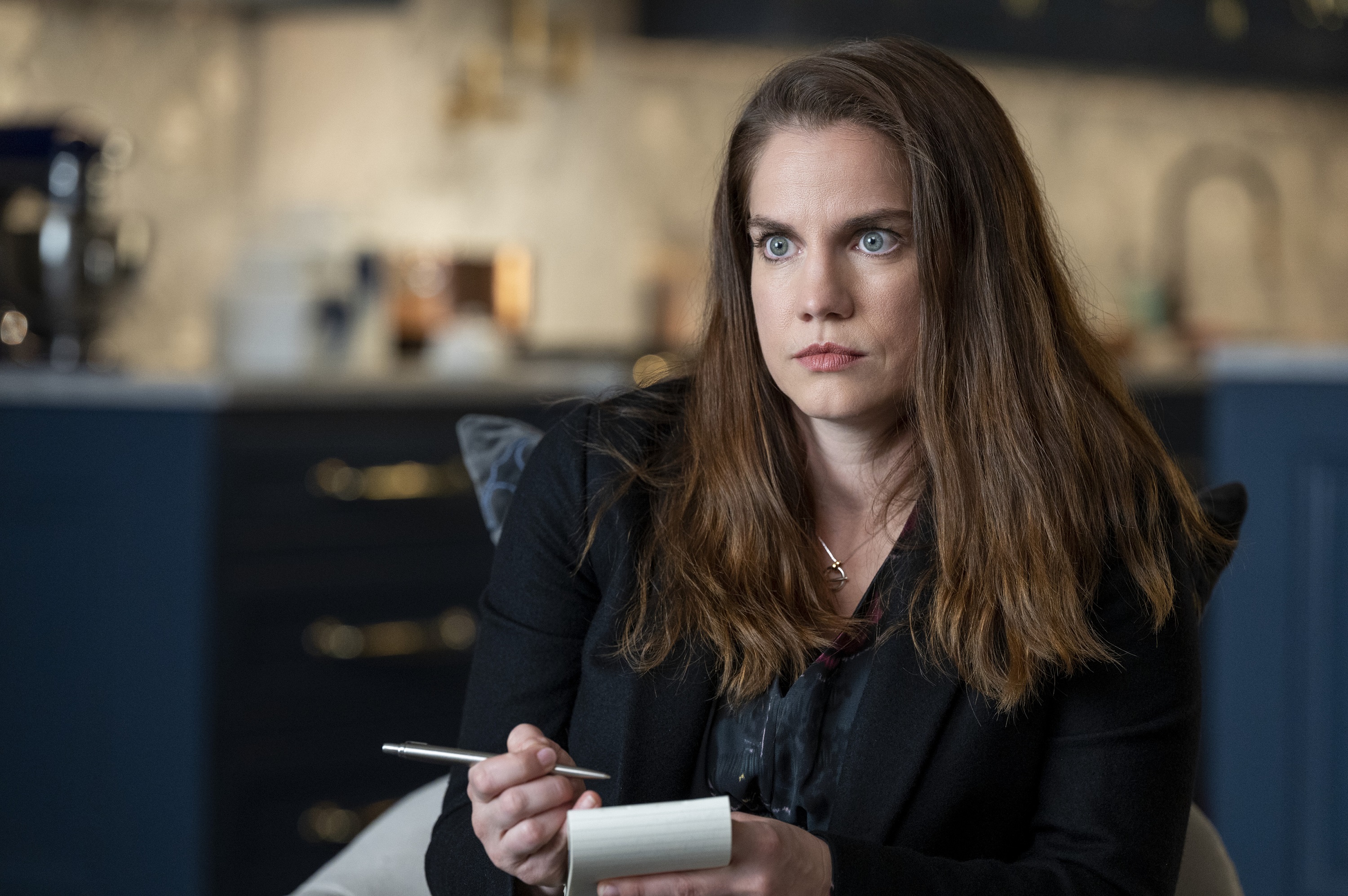 Anna Chlumsky sits with her pen and paper as Vivian Kent in 'Inventing Anna'
