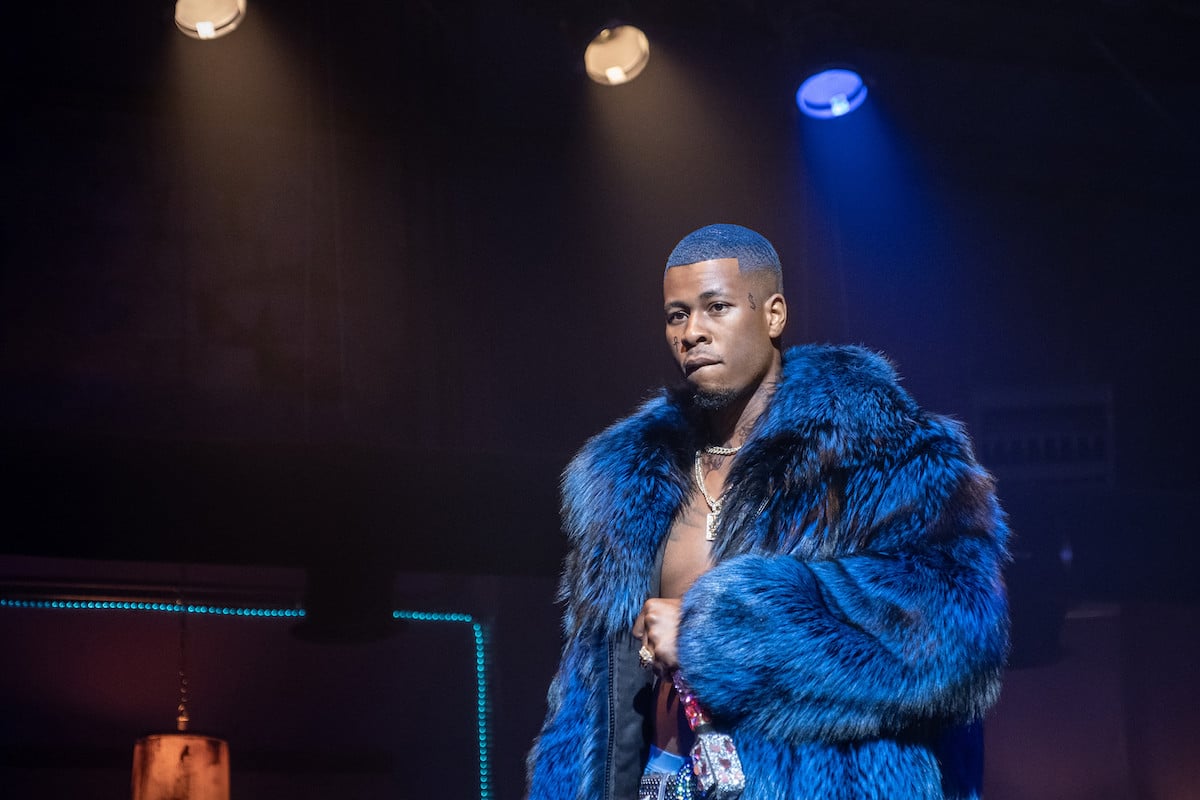 J. Alphonse Nicholson as Lil Murda wearing a blue fur coat in 'P-Valley'