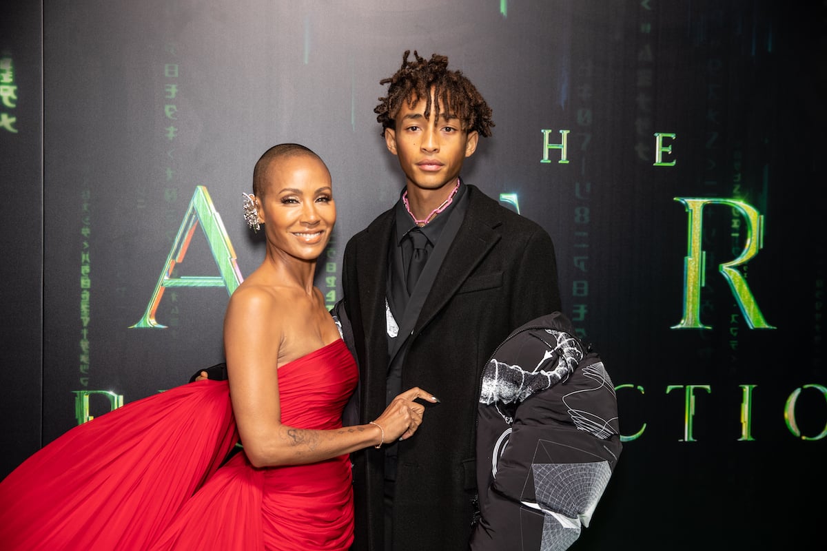 Jaden Smith (R) with Jada Pinkett Smith (R) in front of a black background