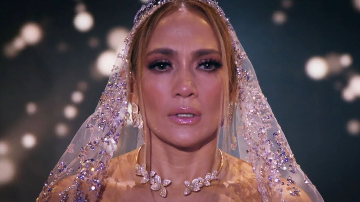 Jennifer Lopez stands in a wedding dress in ‘Marry Me’