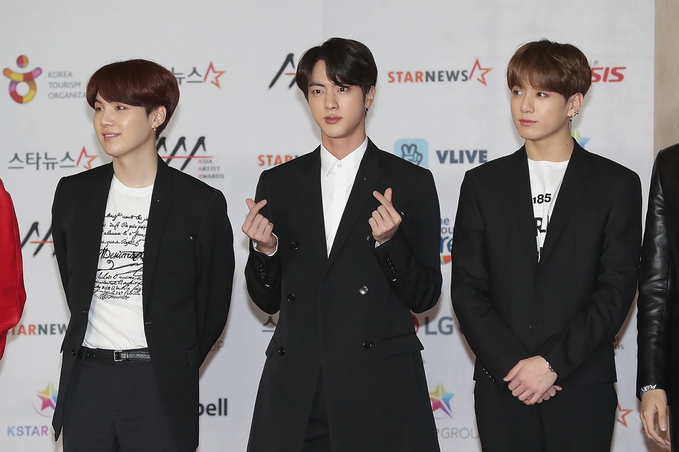 Suga, Jin and JungKook of boy band BTS attends the 2018 Asia Artist Awards