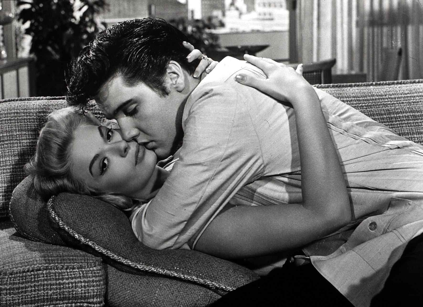 Elvis Presley and Jennifer Holden on a couch