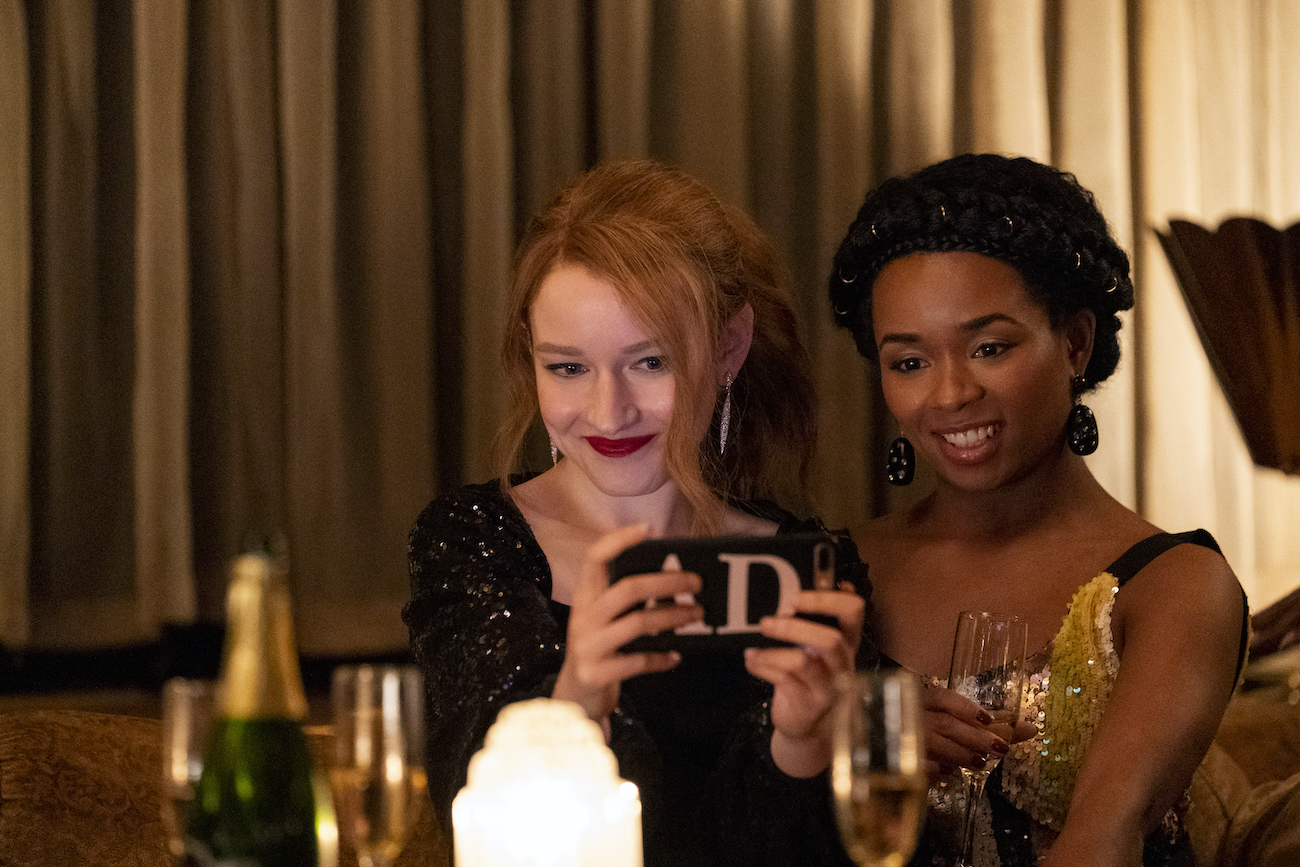 Julia Garner as Anna Delvery, Alexis Floyd as Neff Davis in 'Inventing Anna'
