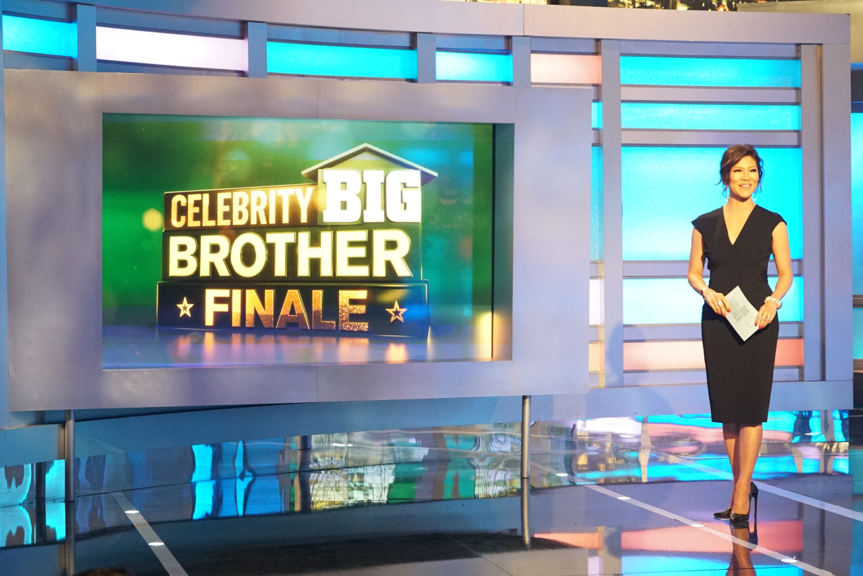 Julie Chen Moonves standing onstage, smiling during 'Celebrity Big Brother 1' season finale
