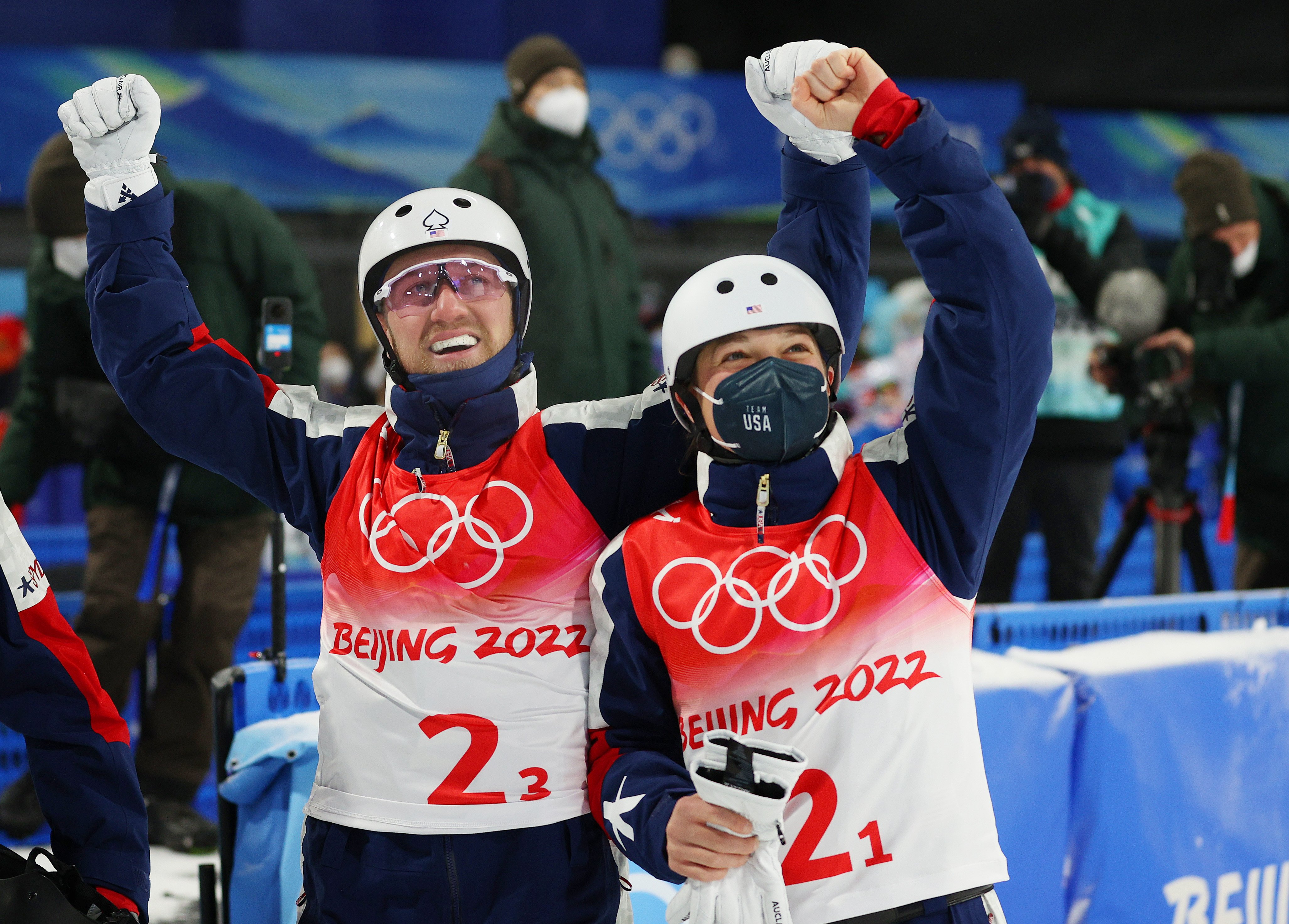 Justin Schoenefeld and Ashley Caldwell celebrating during the Freestyle Skiing Mixed Team Aerials on Day 6 of the 2022 Winter Olympics