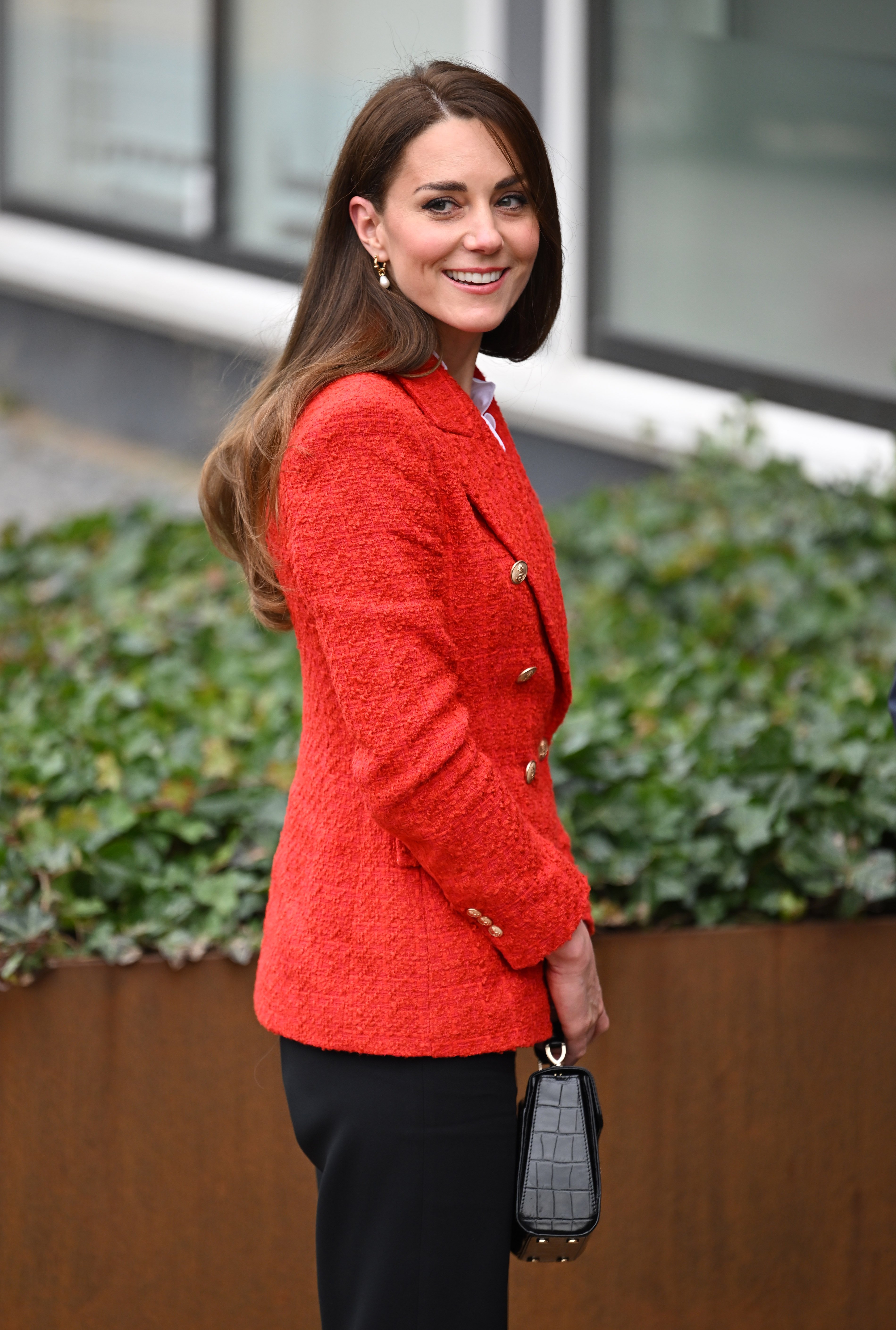 Kate Middleton dons a red Zara blazer during a visit to the Copenhagen Infant Mental Health Project