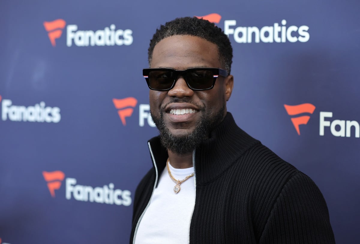 Kevin Hart smiling while wearing shades.