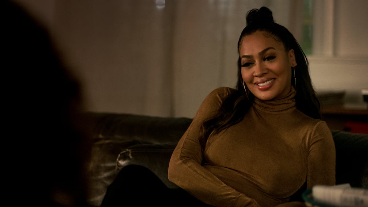La La Anthony as LaKeisha Grant smiling while wearing a brown shirt in 'Power'