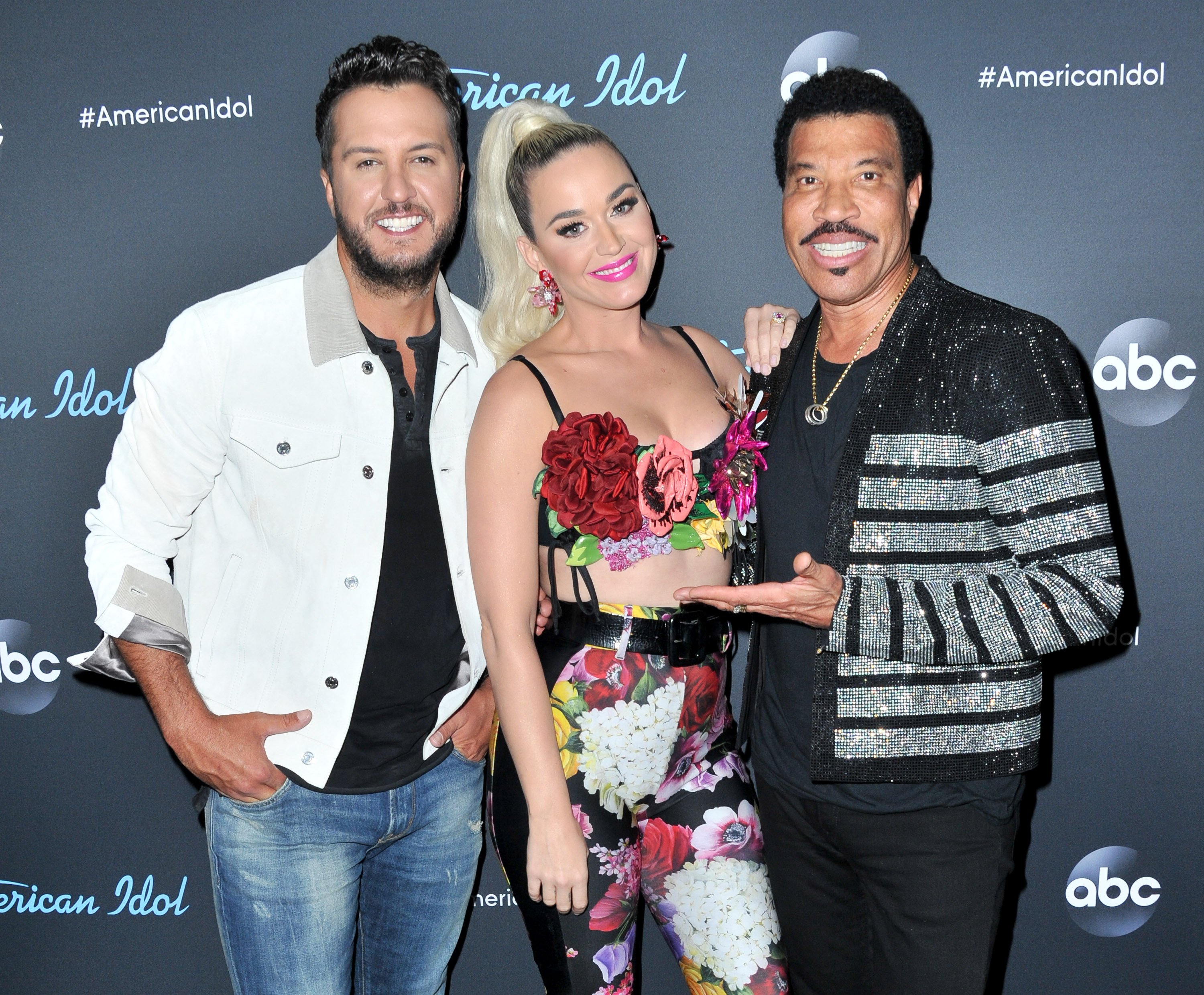 Luke Bryan, Katy Perry, and Lionel Richie post together at an American Idol event.