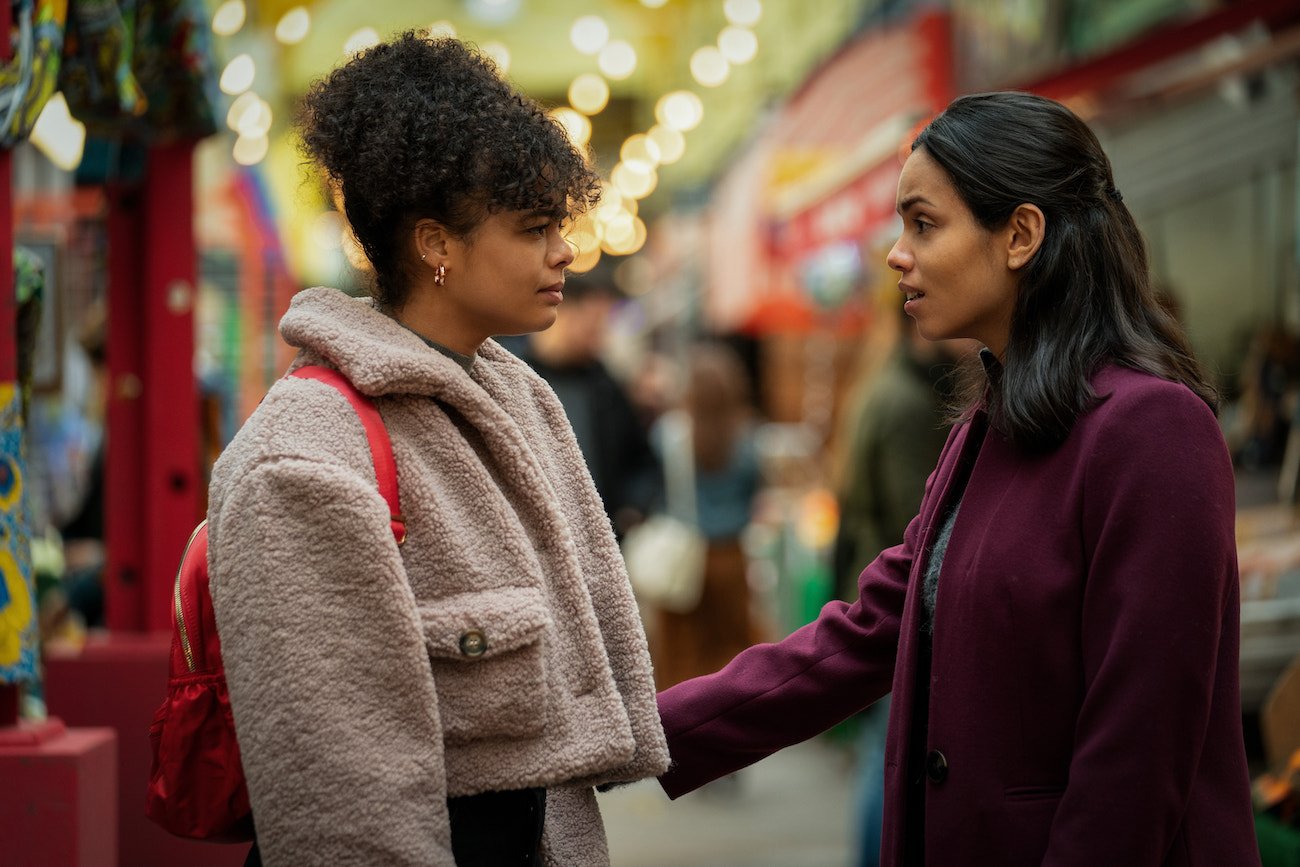 Lydia West and Georgina Campbell look at each other in a scene from 'Suspicion' Season 1 Episode 3 'The Devil You Know'