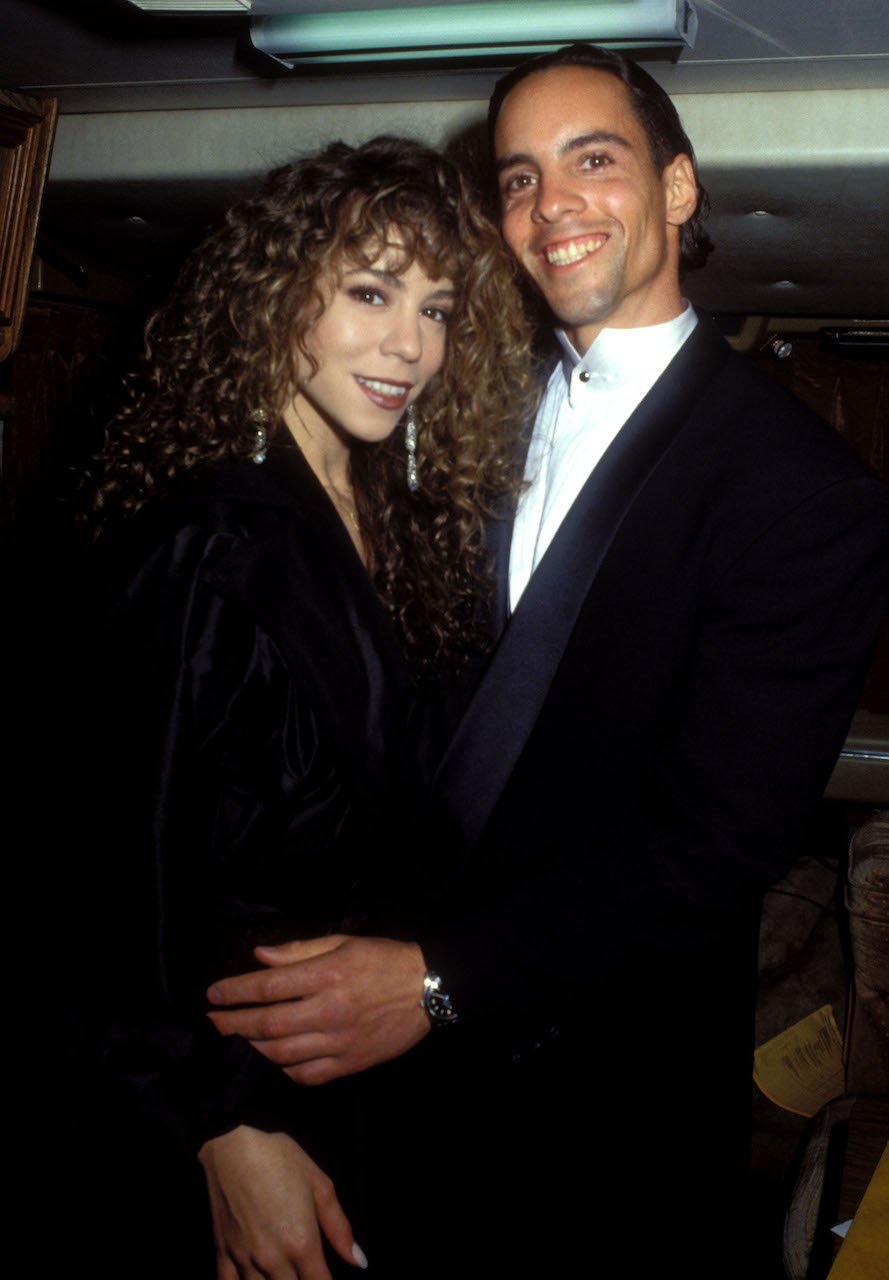 Mariah Carey and her brother Morgan pose for a photo