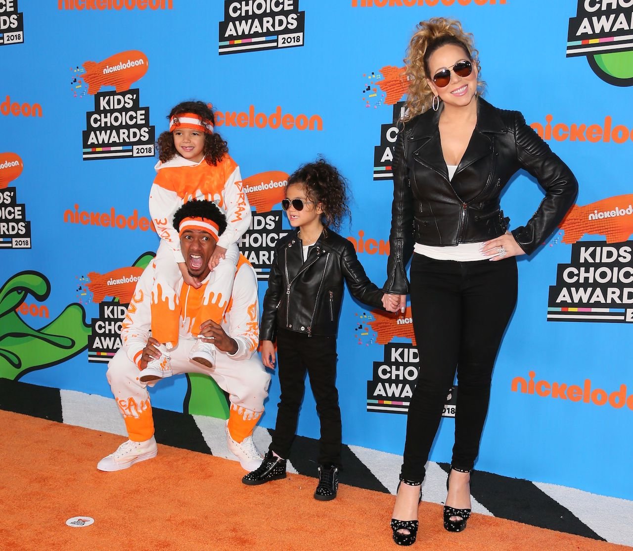Mariah Carey and Nick Cannon pose on the red carpet with their children
