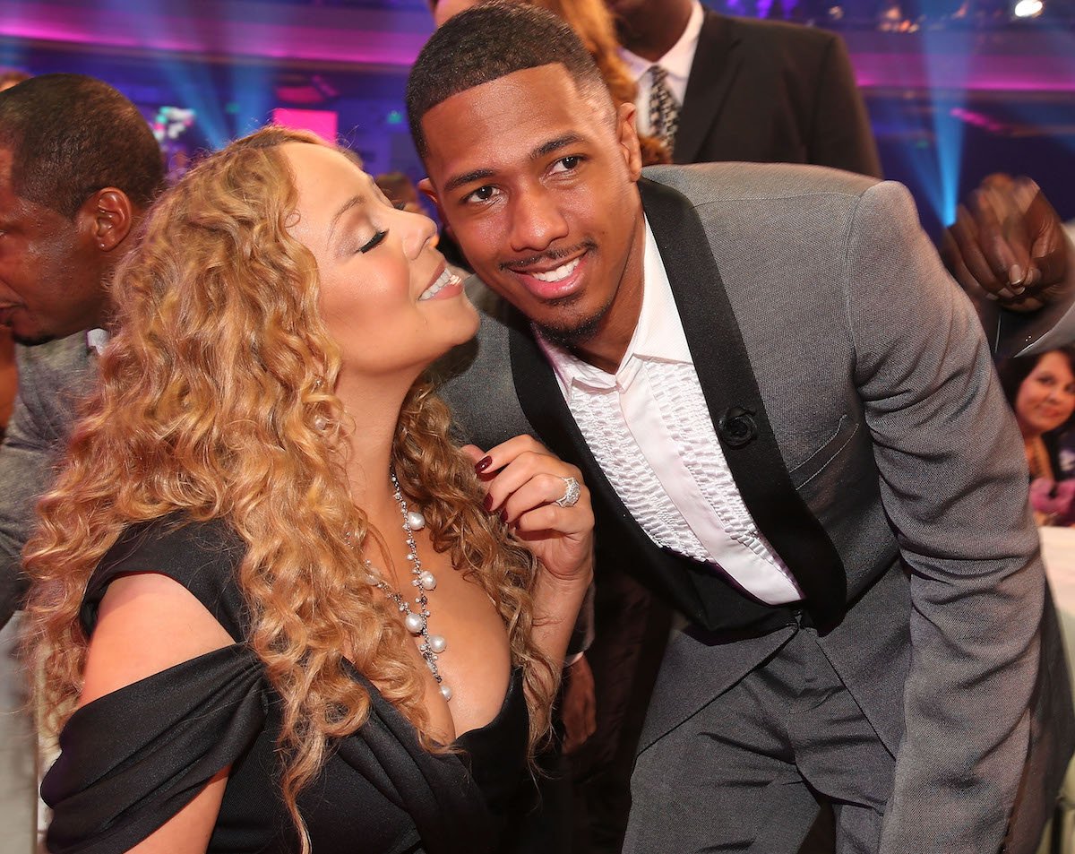 Mariah Carey and Nick Cannon smile for photo